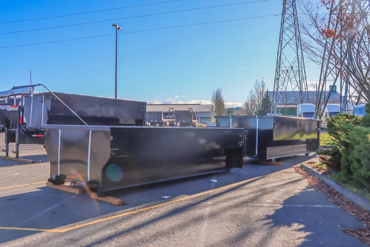 Roll-off dumpster ready for waste disposal at job site for 15 Yard Dumpster Rental in Thomasville